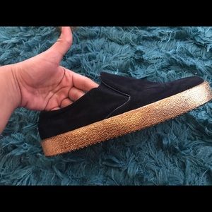 Navy blue and gold bottom slip ons